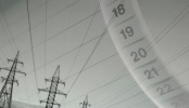 Black and white image of power lines with measurements superimposed on right, tilt